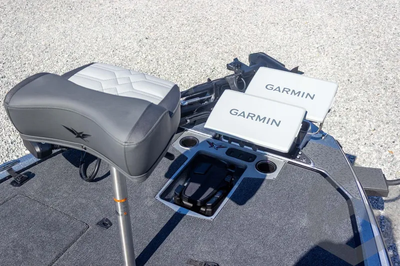 Slide: The Image of 2026 Vexus VXs20 boat with Garmin electronics and cushioned seat on deck. - 31