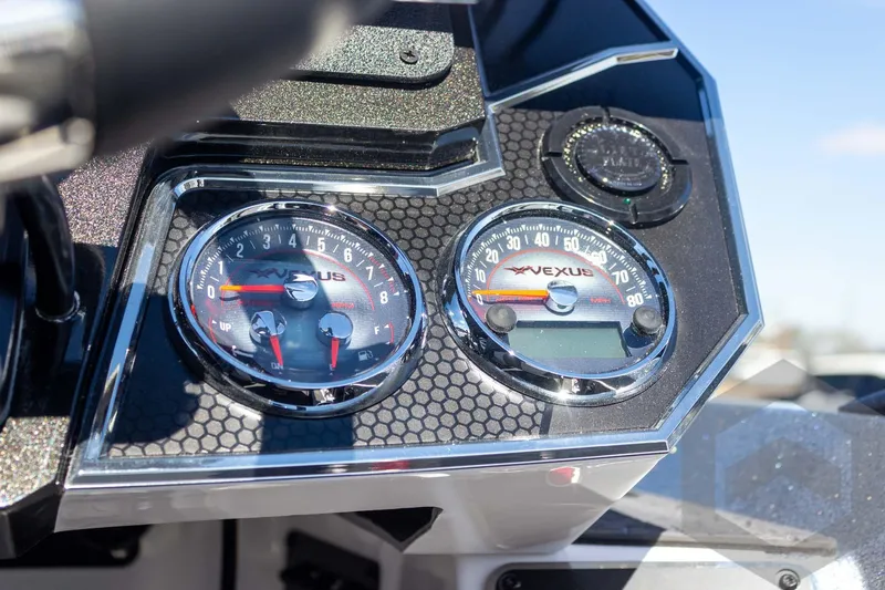Slide: The Image of Dashboard of 2026 Vexus VXs20 boat with dual gauges and sleek design. - 41