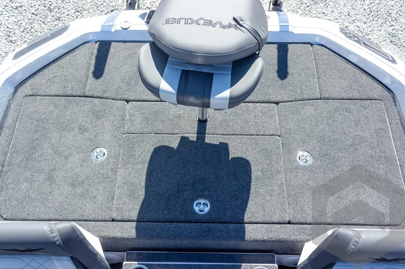 Slide: The Image of 2026 Vexus VXs20 boat deck with cushioned seat and carpeted surface. - 47