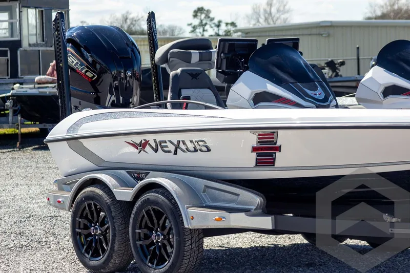Slide: The Image of 2026 Vexus VXs20 boat on trailer, featuring sleek design and modern outboard motor. - 5