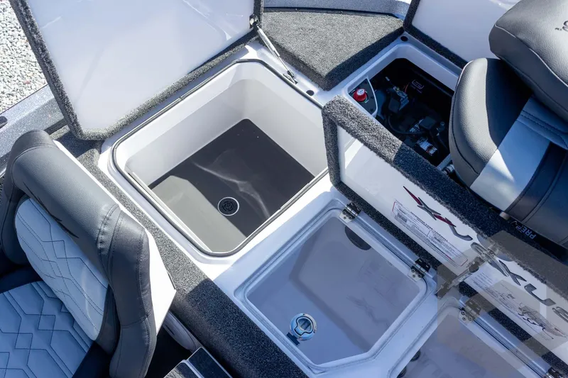 Slide: The Image of 2026 Vexus VXs20 boat interior with storage compartments and seating. - 50