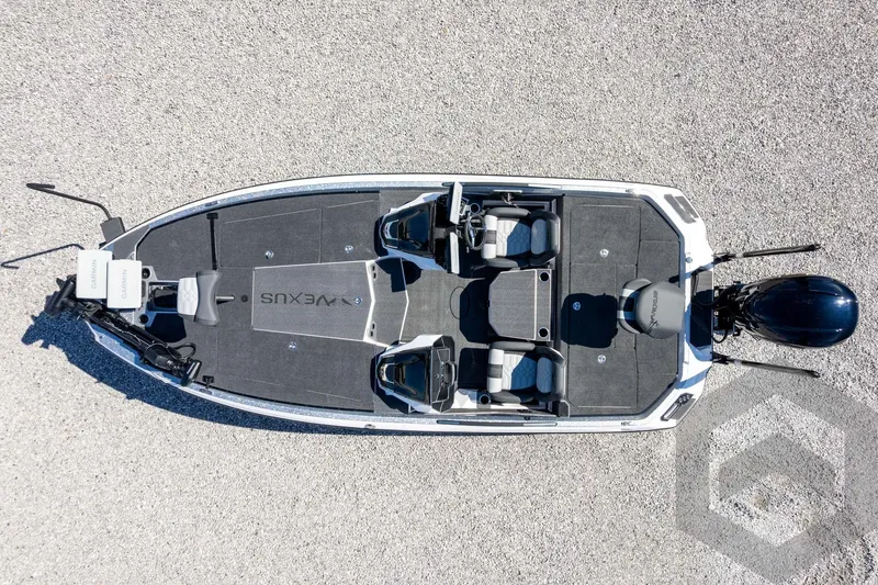 Slide: The Image of 2026 Vexus VXs20 boat, aerial view, showcasing seating and deck layout on gravel background. - 53
