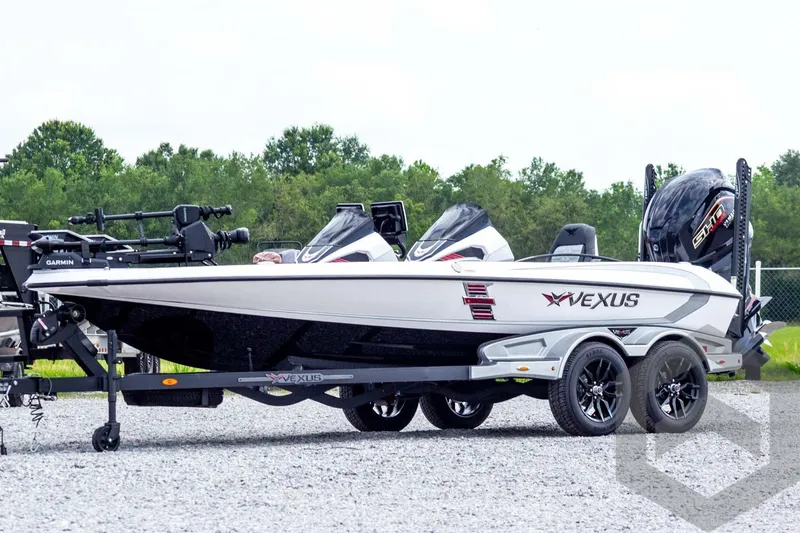 Slide: The Image of 2026 Vexus VXs20 boat on trailer, featuring sleek design and advanced Garmin equipment. - 65