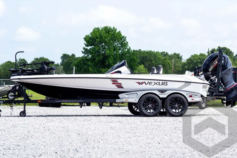 Slide: The Image of 2026 Vexus VXs20 boat on trailer, parked outdoors, showcasing sleek design and modern features. - 66