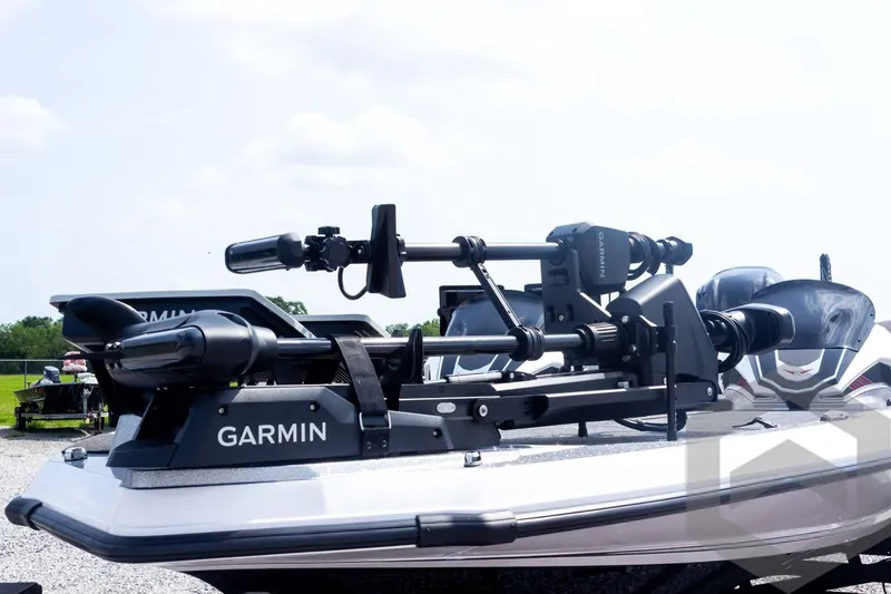 Slide: The Image of 2026 Vexus VXs20 boat featuring Garmin equipment on deck, under a clear sky. - 69