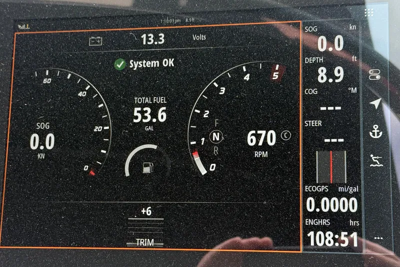 Slide: The Image of Dashboard display of a 2020 Sea Ray SLX 280 showing fuel, RPM, and system status. - 11