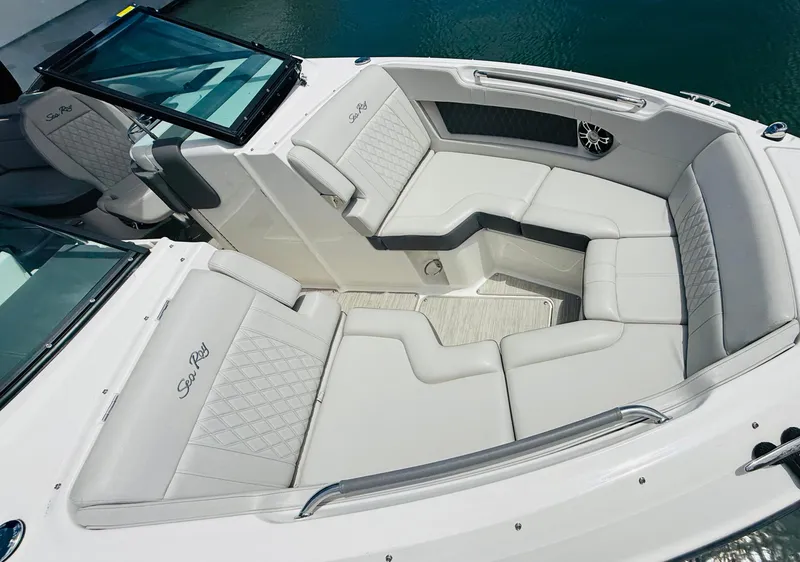 Slide: The Image of 2020 Sea Ray SLX 280 boat interior with luxurious seating and elegant design. - 15