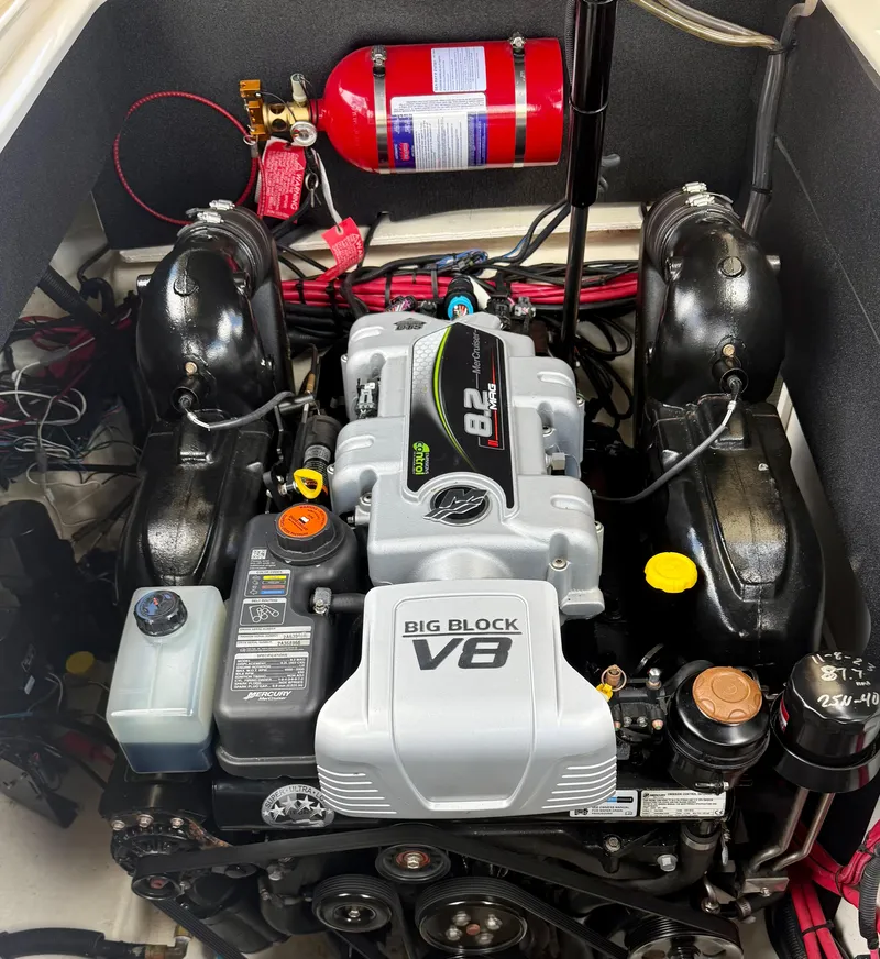 Slide: The Image of Engine compartment of a 2020 Sea Ray SLX 280 with a Big Block V8 engine. - 31