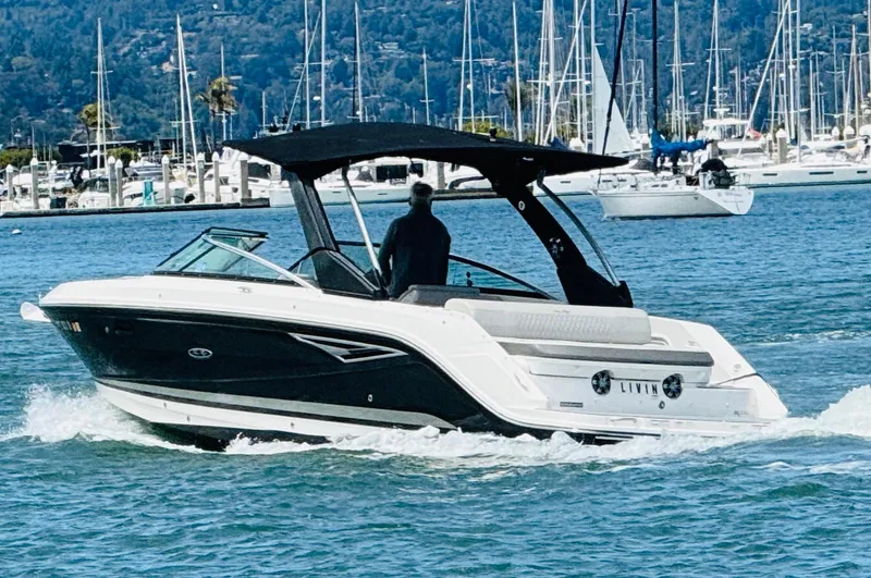 Slide: The Image of 2020 Sea Ray SLX 280 boat cruising thru Sausalito marina. - 4