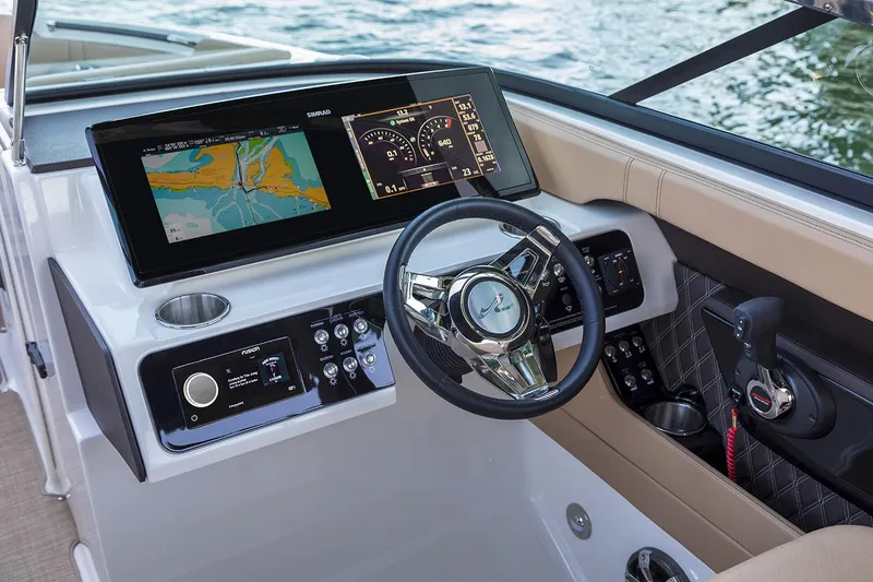Slide: The Image of Manufacturer Provided Image: 2020 Sea Ray SLX 280 boat dashboard with navigation and control systems. - 9