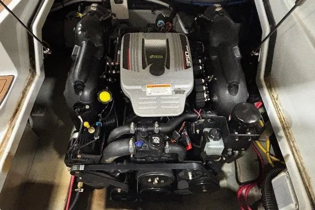 Slide: The Image of 2017 Crownline Eclipse E4 boat engine, detailed view of the engine compartment. - 18