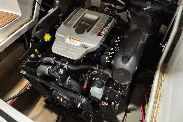 Slide: The Image of 2017 Crownline Eclipse E4 engine compartment showcasing a powerful 350 horsepower engine. - 19