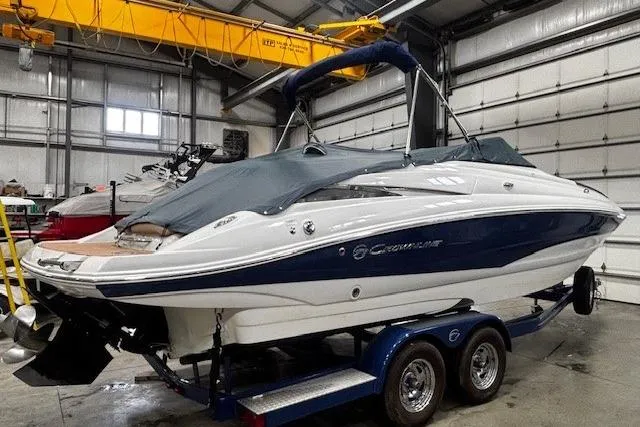 Slide: The Image of 2017 Crownline Eclipse E4 boat on trailer in indoor storage facility. - 20