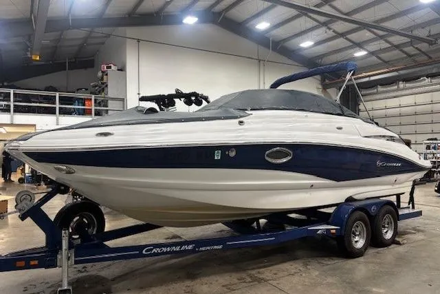 Slide: The Image of 2017 Crownline Eclipse E4 boat on trailer in indoor storage facility. - 23