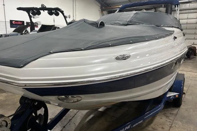Slide: The Image of 2017 Crownline Eclipse E4 boat with cover in indoor storage. - 24