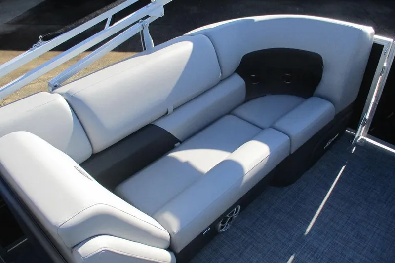 Slide: The Image of 2026 Sun Tracker Party Barge 22 DLX interior seating with gray upholstery. - 11