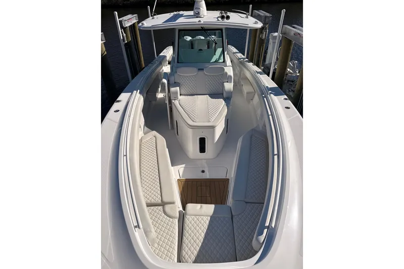 Slide: The Image of 2022 HCB 42 Lujo boat with luxurious seating and sleek design. - 3