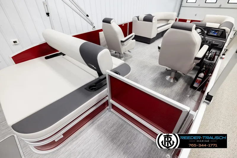 Slide: The Image of 2026 Bennington SSBSF boat interior with modern seating and steering console. - 12