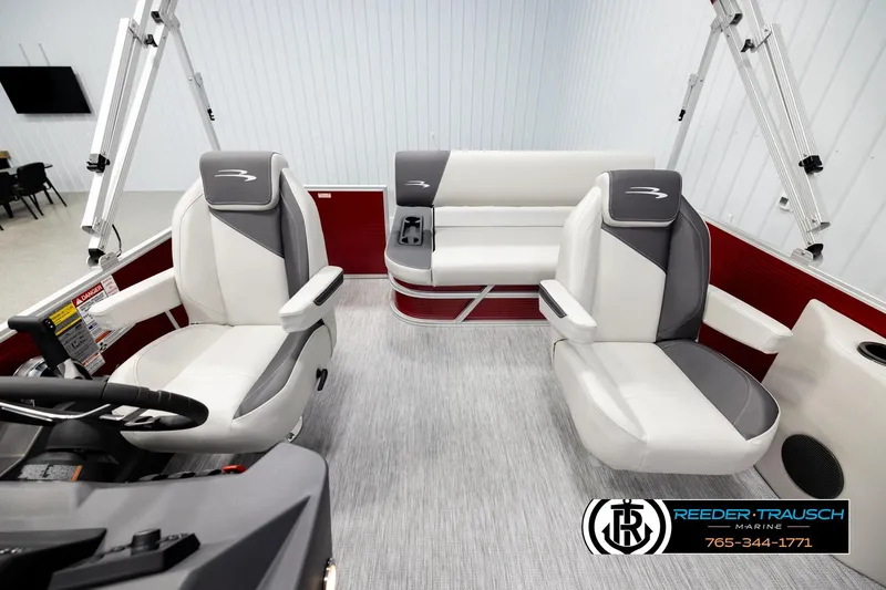 Slide: The Image of 2026 Bennington SSBSF boat interior with plush seating and modern design. - 14