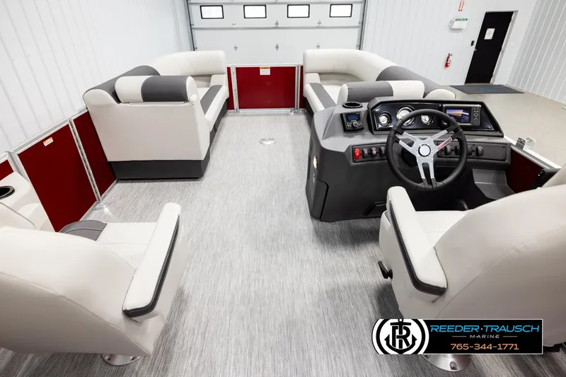 Slide: The Image of Interior of 2026 Bennington SSBSF pontoon boat with modern seating and control console. - 17