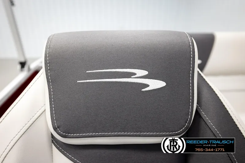 Slide: The Image of Gray and white Bennington SSBSF 2026 boat seat with logo, Reeder-Trausch Marine branding. - 29