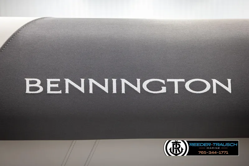 Slide: The Image of Bennington SSBSF 2026 boat cover with Reeder-Trausch Marine logo and contact information. - 31