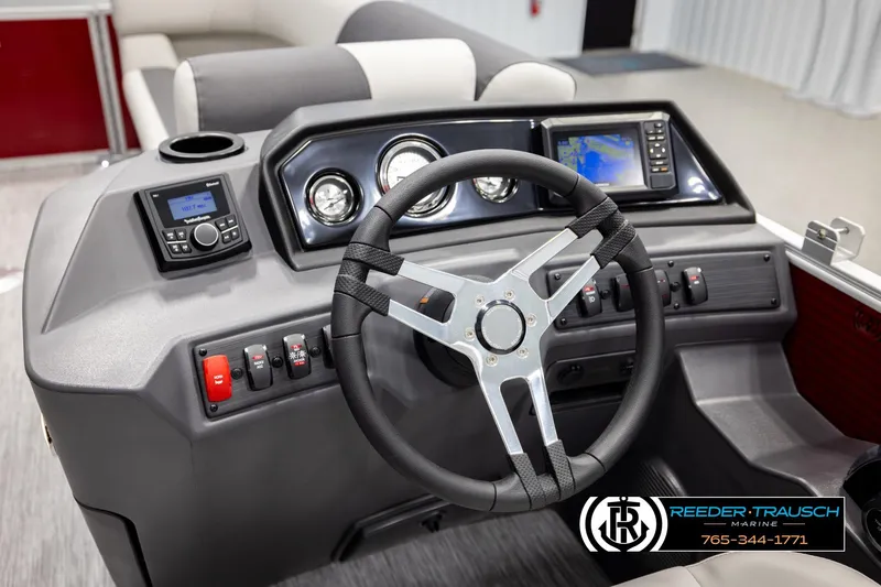 Slide: The Image of 2026 Bennington SSBSF boat dashboard with steering wheel and control panel. - 33
