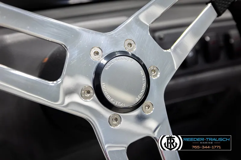 Slide: The Image of Steering wheel of 2026 Bennington SSBSF boat, featuring sleek metallic design. - 34