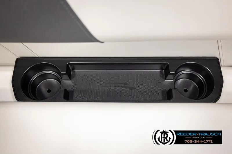 Slide: The Image of 2026 Bennington SSBSF boat cup holders and tray, featuring sleek black design. - 43