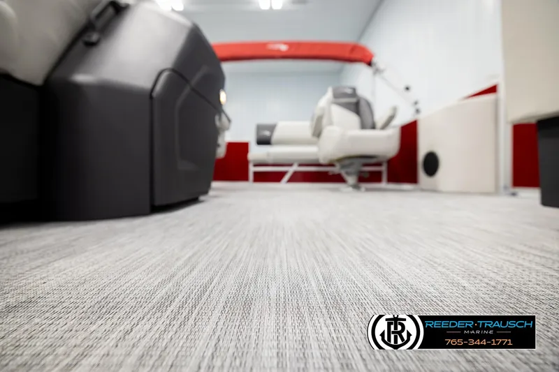 Slide: The Image of Interior of 2026 Bennington SSBSF boat with modern seating and flooring. - 47