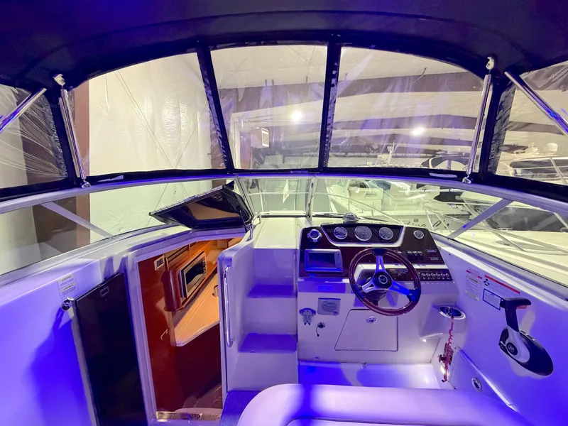 Slide: The Image of Interior view of 2012 Sea Ray Sundancer 280 yacht cockpit. - 10
