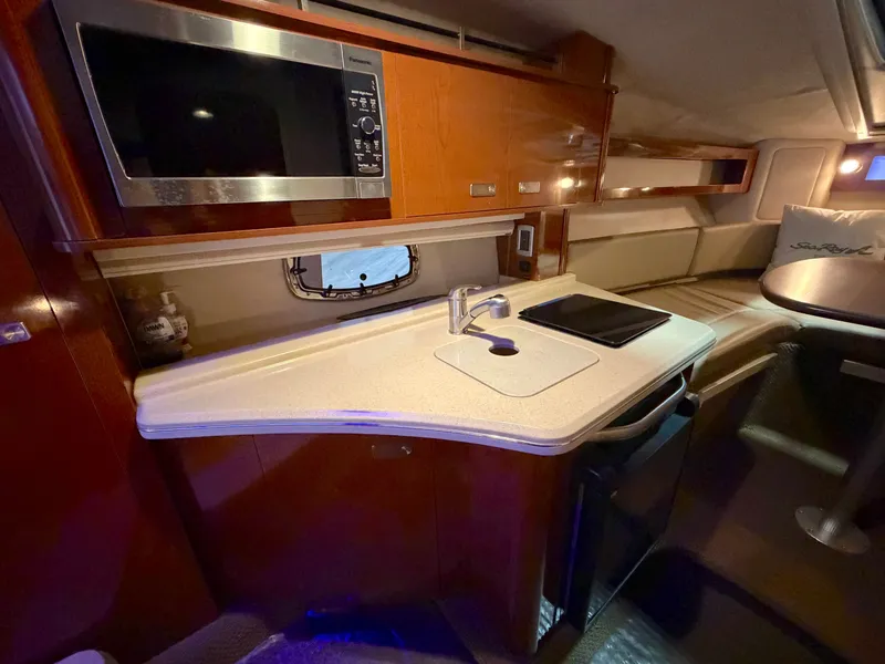 Slide: The Image of Interior of 2012 Sea Ray Sundancer 280 yacht kitchen. - 20