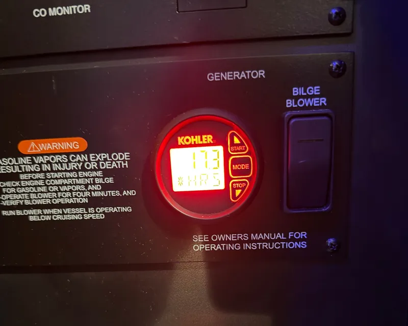 Slide: The Image of Kohler generator display on 2012 Sea Ray Sundancer 280. - 26