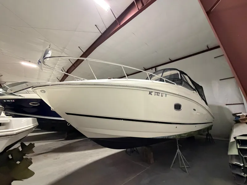 Slide: The Image of 2012 Sea Ray Sundancer 280 stored in a warehouse. - 3