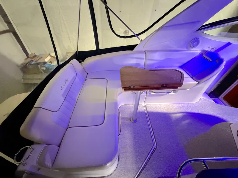 Slide: The Image of Interior of a 2012 Sea Ray Sundancer 280 with seating area. - 6