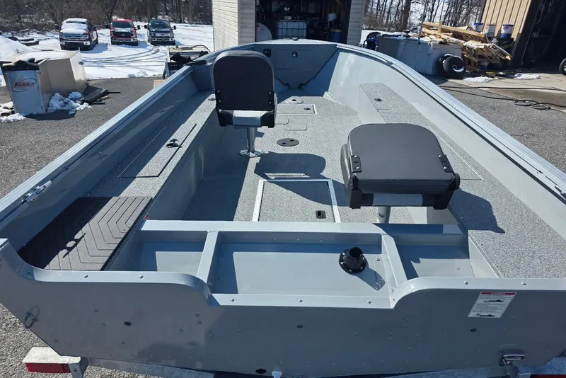 Slide: The Image of 2026 Smoker Craft Freedom 160 TL boat interior with seating and storage compartments. - 6