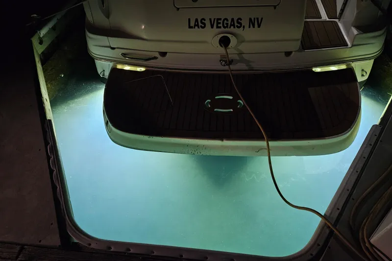 Slide: The Image of 2005 Sea Ray Sundancer 280 docked at night, illuminated underwater lights, Las Vegas, NV. - 36