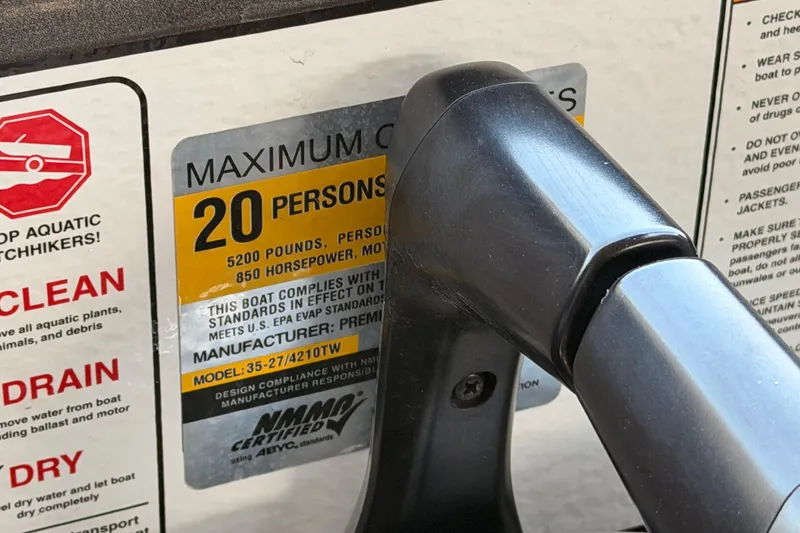 Slide: The Image of 2022 Premier 350 Escalante boat capacity label, 20 persons, 5200 pounds, 850 horsepower. - 11
