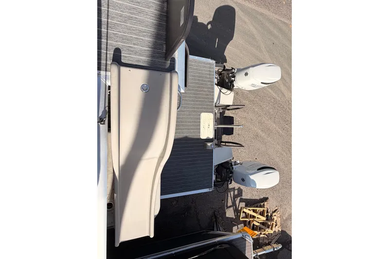 Slide: The Image of 2022 Premier 350 Escalante boat with dual outboard motors, rear view. - 21