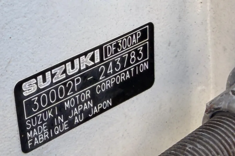 Slide: The Image of Suzuki motor label on Premier 350 Escalante, 2022 model, made in Japan. - 27