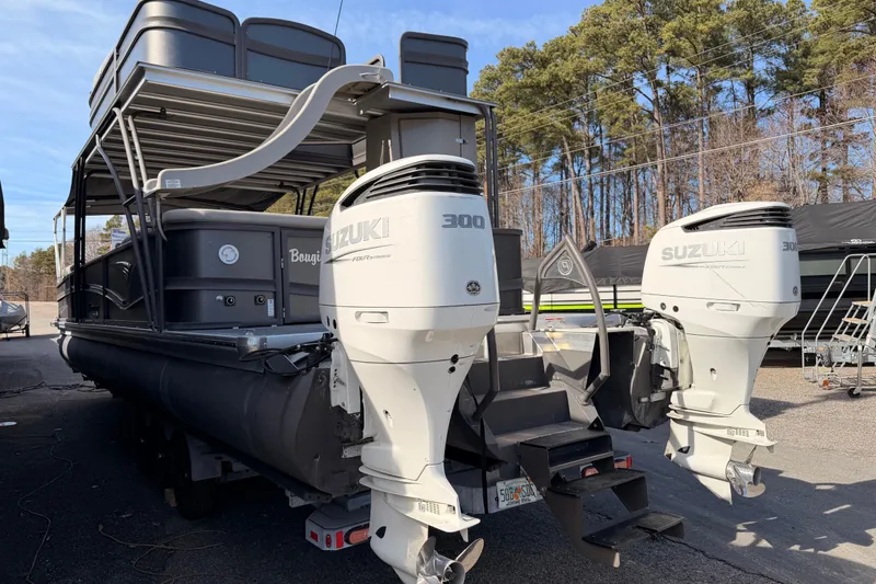 Slide: The Image of 2022 Premier 350 Escalante pontoon boat with dual Suzuki 300 outboard motors. - 3