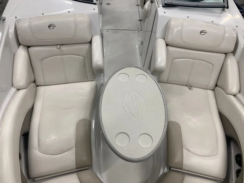 Slide: The Image of Interior of 2009 Crownline 240LS Bowrider with beige seating. - 11