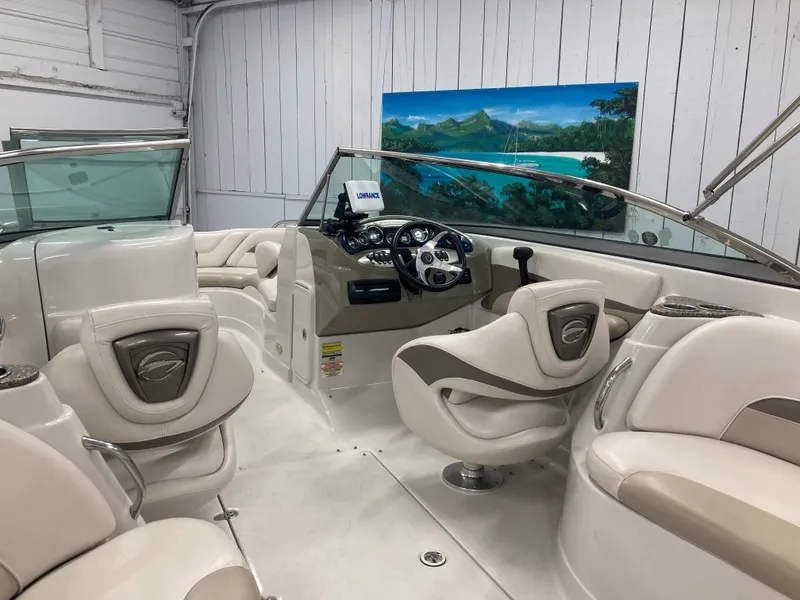 Slide: The Image of Interior of a 2009 Crownline 240LS Bowrider boat, luxurious design. - 19