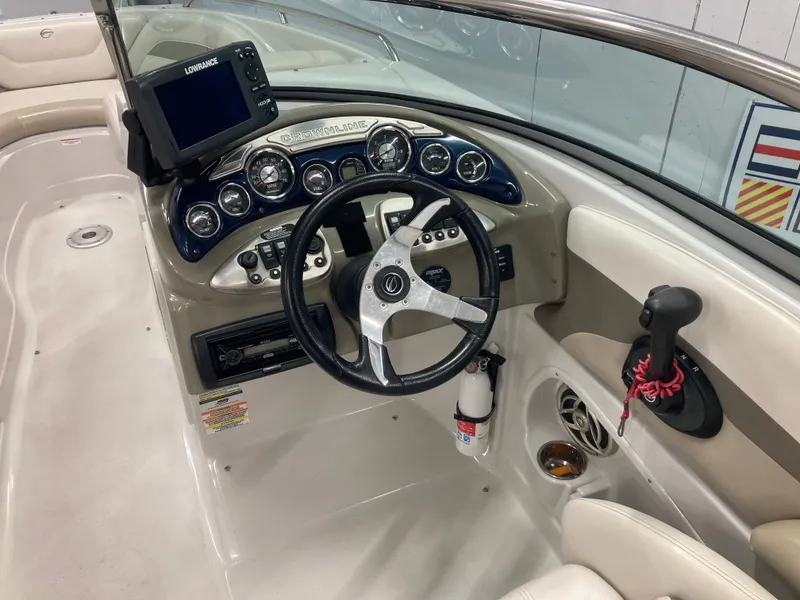 Slide: The Image of Interior view of 2009 Crownline 240LS Bowrider cockpit with controls. - 20