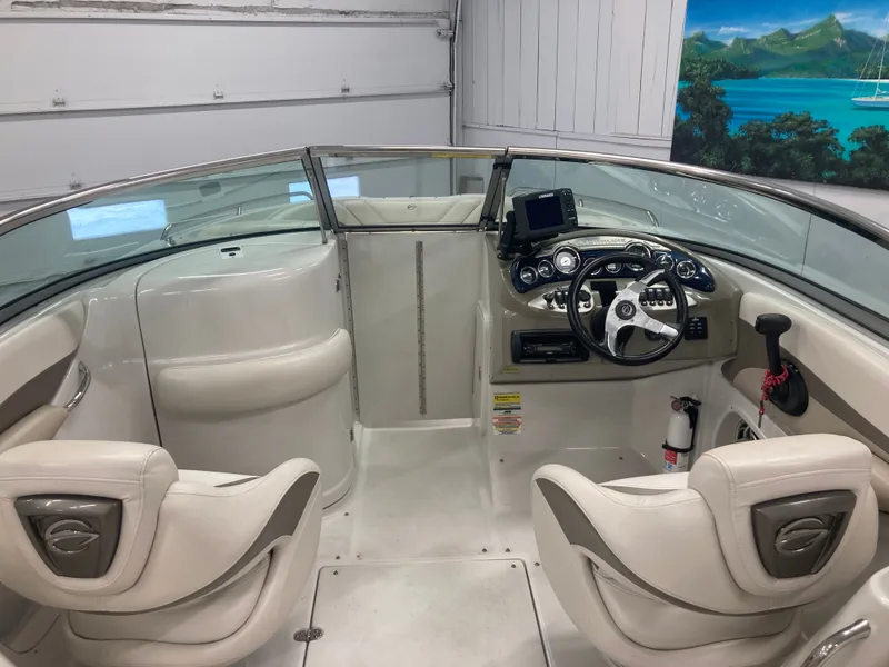 Slide: The Image of Interior of a 2009 Crownline 240LS Bowrider boat. - 23