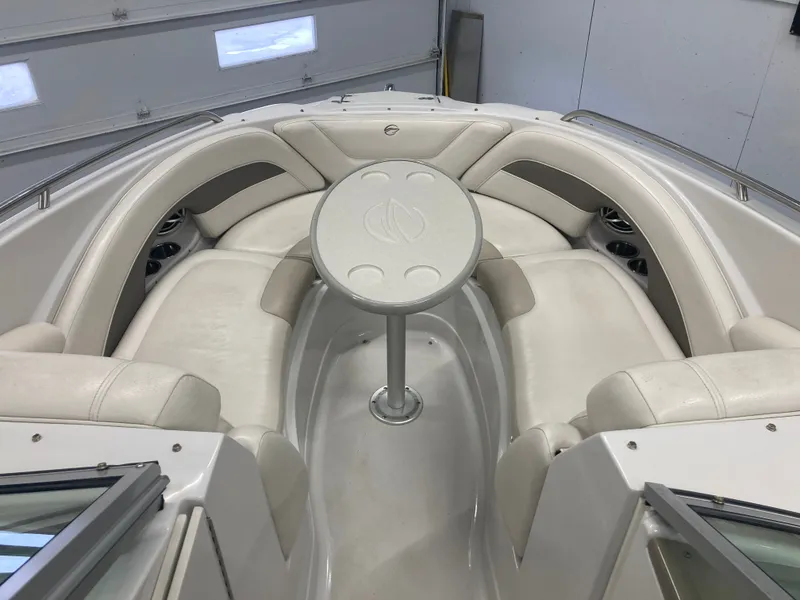 Slide: The Image of Interior of 2009 Crownline 240LS Bowrider with table and seating area. - 28