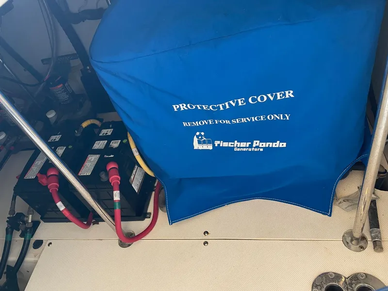 Slide: The Image of Pursuit SC 365i Sport Coupe 2014 engine room with Fischer Panda generator cover. - 32