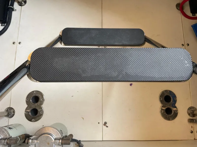 Slide: The Image of Engine room of 2014 Pursuit SC 365i Sport Coupe with visible components and steps. - 33