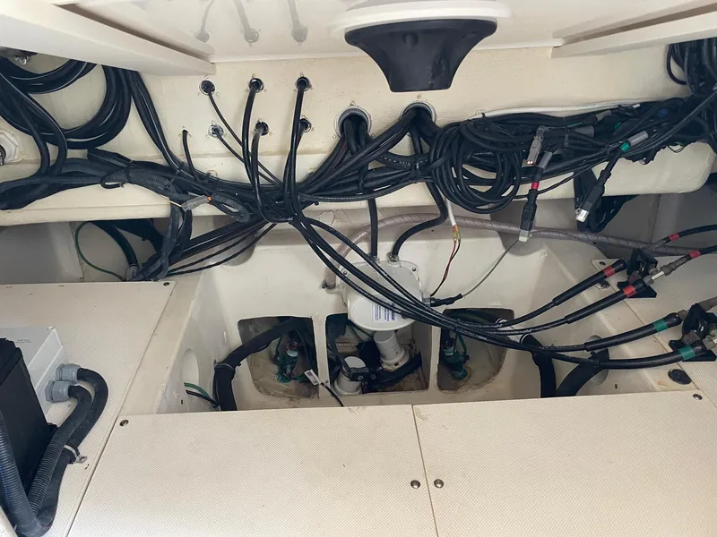 Slide: The Image of 2014 Pursuit SC 365i Sport Coupe wiring and engine compartment. - 37