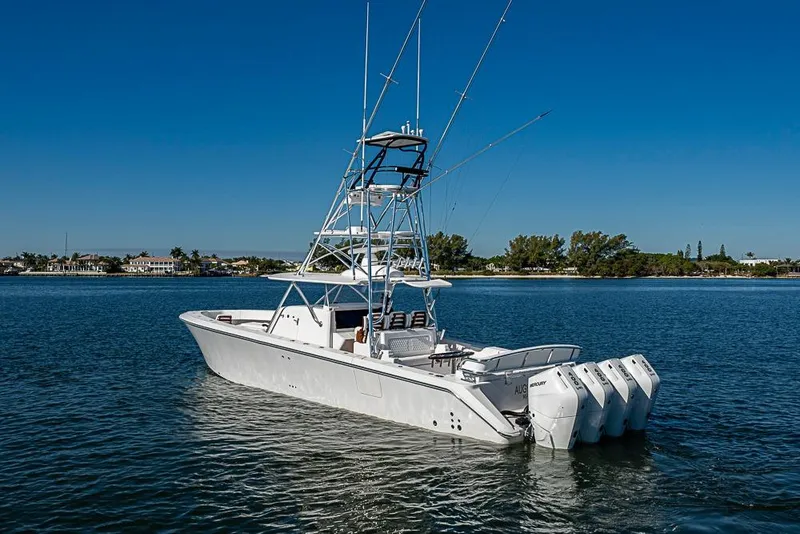 Slide: The Image of Luxury Sparks 46 boat, 2025 model, with multiple engines on calm water. - 102